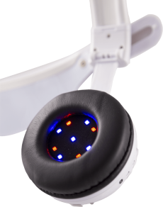 Close-up of a headphone earcup with blue and red LED lights.